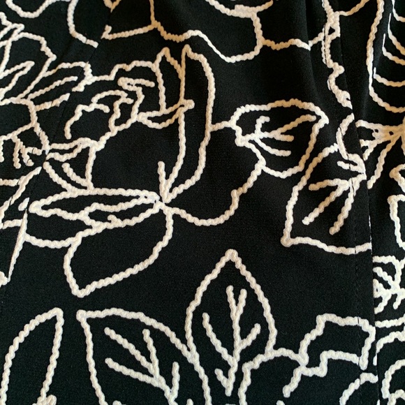 Beautiful black dress, with white floral design, smoke & pet free home - Picture 10 of 11